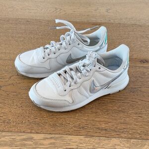 Nike Women’s White Sneakers with Iridescent Swoosh